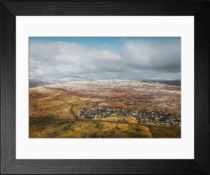 Framed Print : Aerial shot of the town Torshavn as taken during a helicopter flight on an early spring morning with snow-covered Framed Print : Aerial shot of the town Torshavn as taken during a helicopter flight on an early spring morning with snow-covered