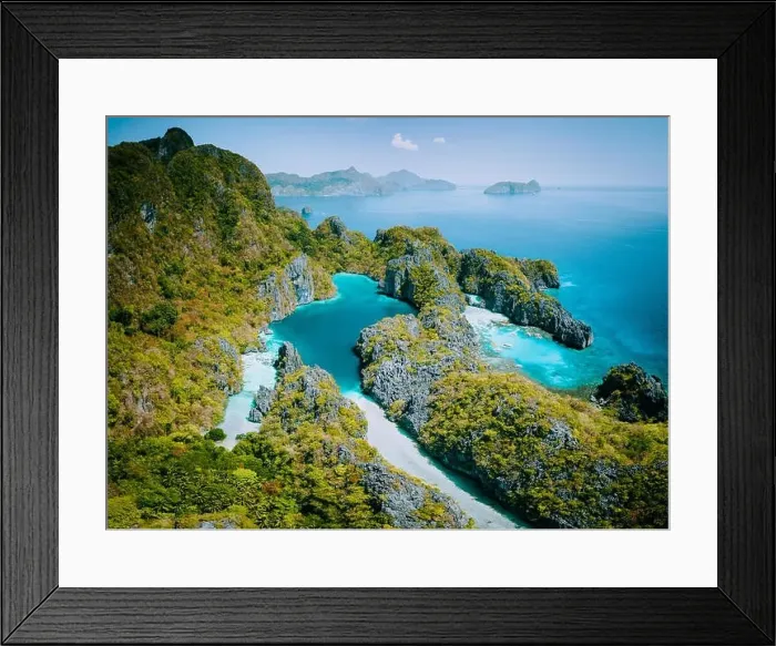 Framed Print : Palawan, Philippines aerial drone view of turquoise lagoon and limestone cliffs. El Nido Marine Reserve Park Framed Print : Palawan, Philippines aerial drone view of turquoise lagoon and limestone cliffs. El Nido Marine Reserve Park