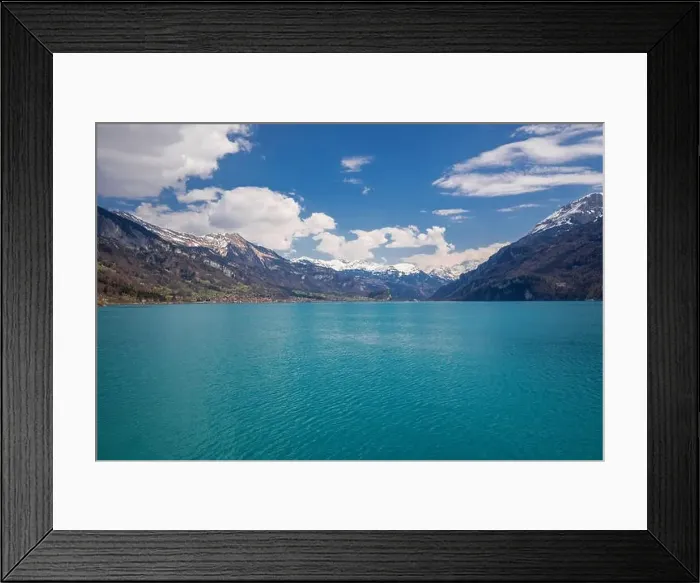 Framed Print : Brienz town on lake Brienz by Interlaken with the Swiss Alps covered by snow in the background, Switzerland, Europe Framed Print : Brienz town on lake Brienz by Interlaken with the Swiss Alps covered by snow in the background, Switzerland, Europe