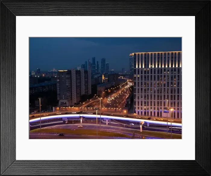 Framed Print : description: Evening view of the city streets Framed Print : description: Evening view of the city streets