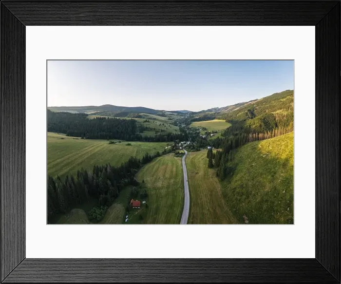 Framed Print : Road going through forests and villages of the Liptov region in Slovakia Framed Print : Road going through forests and villages of the Liptov region in Slovakia