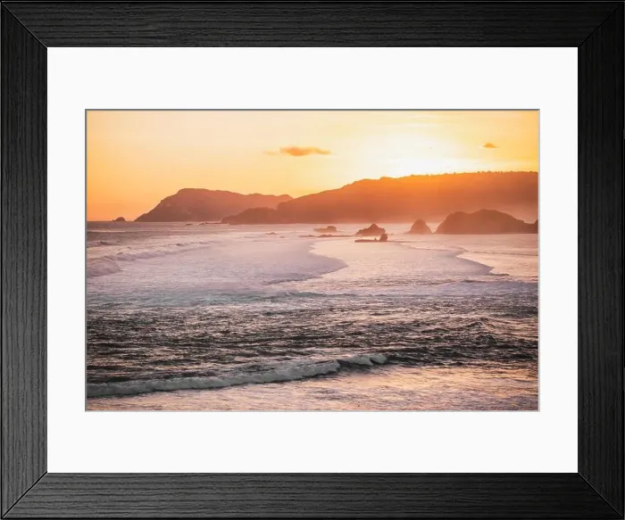 Framed Print : Sunset landscape with huge waves and mountain hills on horizon Framed Print : Sunset landscape with huge waves and mountain hills on horizon