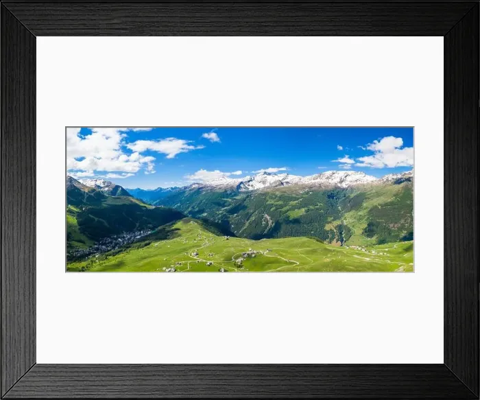Framed Print : Aerial panoramic of Andossi and village of Madesimo on left, Valchiavenna, Sondrio province, Valtellina, Lombardy, Italy Framed Print : Aerial panoramic of Andossi and village of Madesimo on left, Valchiavenna, Sondrio province, Valtellina, Lombardy, Italy