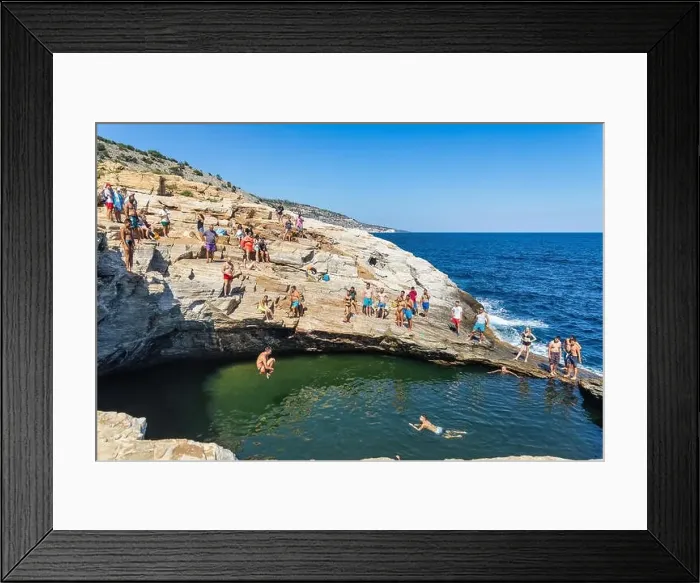 Framed Print : Thassos, Greece - July 20, 2019: Tourists are doing diving in the natural swimming pool Giola in Thassos island, Greece Framed Print : Thassos, Greece - July 20, 2019: Tourists are doing diving in the natural swimming pool Giola in Thassos island, Greece