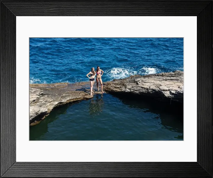 Framed Print : Thassos, Greece - July 20, 2019: Tourists are doing diving in the natural swimming pool Giola in Thassos island, Greece Framed Print : Thassos, Greece - July 20, 2019: Tourists are doing diving in the natural swimming pool Giola in Thassos island, Greece