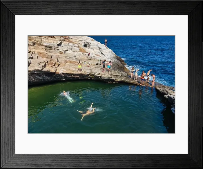 Framed Print : Thassos, Greece - July 20, 2019: Tourists are doing diving in the natural swimming pool Giola in Thassos island, Greece Framed Print : Thassos, Greece - July 20, 2019: Tourists are doing diving in the natural swimming pool Giola in Thassos island, Greece