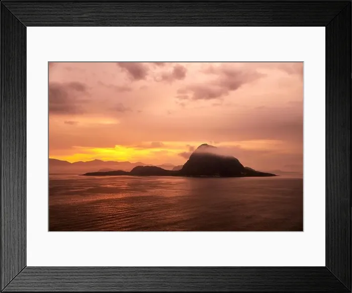 Framed Print : Rock Hessa nearby Alesund / Norway in the ocean with clouds in sunrise Framed Print : Rock Hessa nearby Alesund / Norway in the ocean with clouds in sunrise