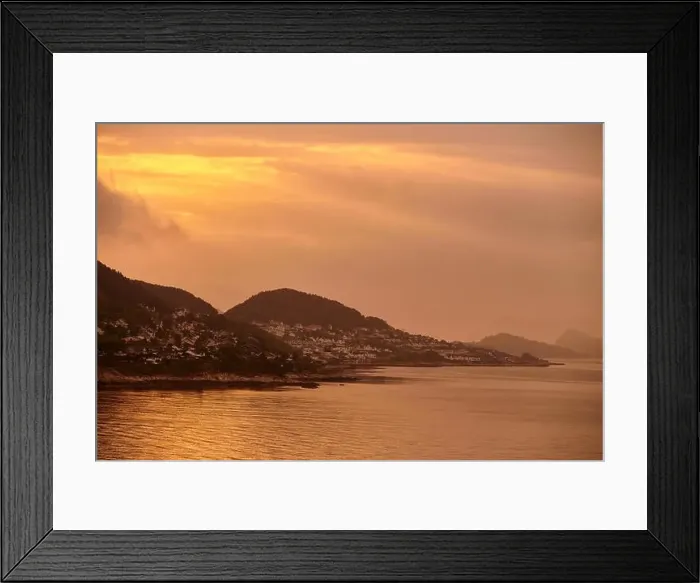 Framed Print : golden sunrise with little houses on hills in norway Framed Print : golden sunrise with little houses on hills in norway
