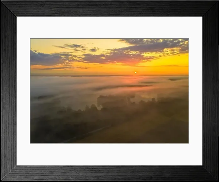 Framed Print : Morning fog over a lake while the sun is rising Framed Print : Morning fog over a lake while the sun is rising