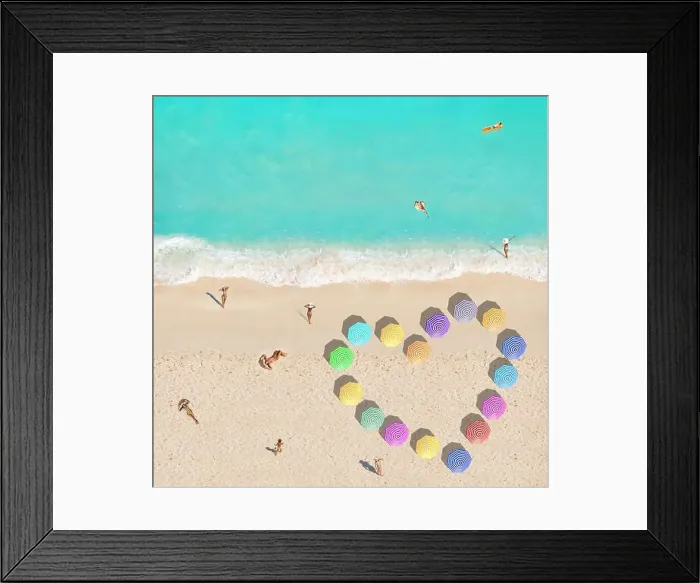 Framed Print : People on beach and heart shape made of umbrellas Framed Print : People on beach and heart shape made of umbrellas