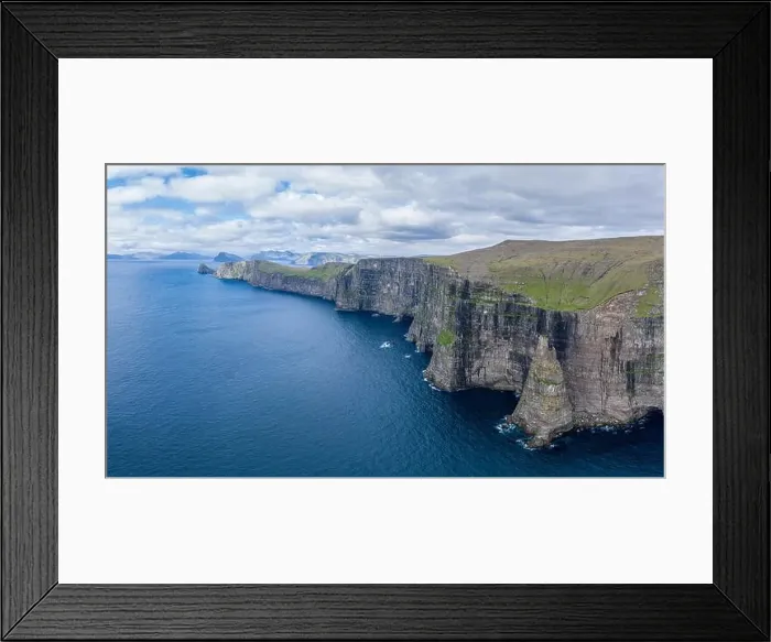 Framed Print : Panoramic aerial view from Sandoy island cliffs under the clouds, Faroe Islands Framed Print : Panoramic aerial view from Sandoy island cliffs under the clouds, Faroe Islands