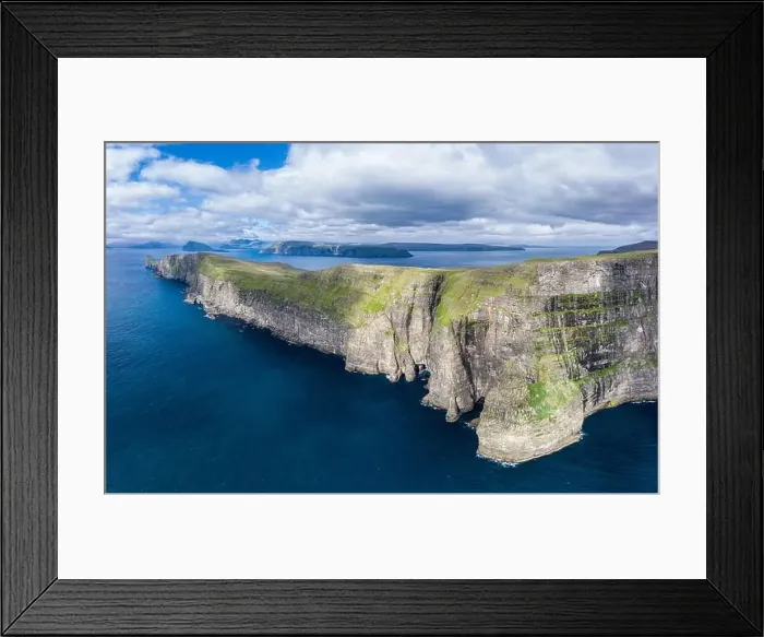Framed Print : Panoramic aerial view from Sandoy island cliffs under the clouds, Faroe Islands Framed Print : Panoramic aerial view from Sandoy island cliffs under the clouds, Faroe Islands