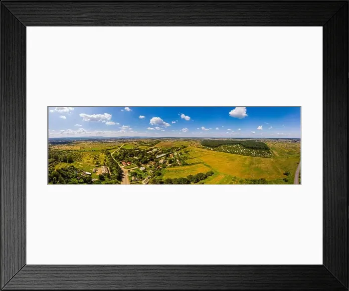 Framed Print : Panoramic landscape of countryside it the west of Ukraine. Aerial drone view of traditional Ukrainian village Framed Print : Panoramic landscape of countryside it the west of Ukraine. Aerial drone view of traditional Ukrainian village