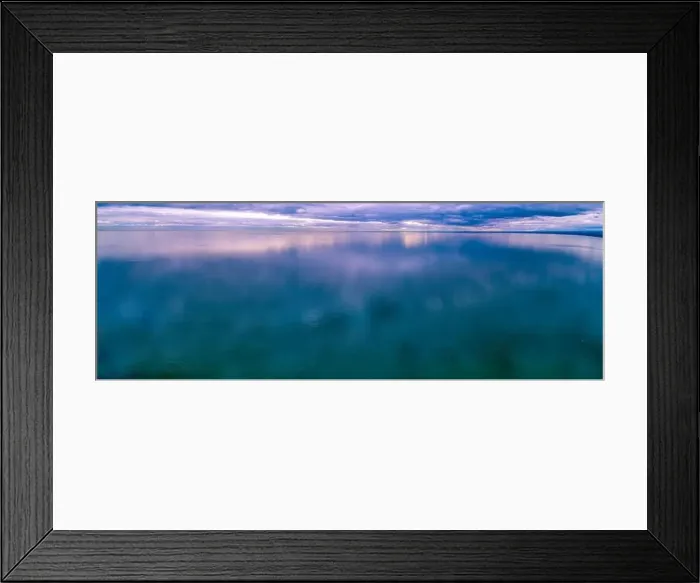 Framed Print : Storm low clouds reflecting in smooth and calm ocean water - aerial panoramic seascape Framed Print : Storm low clouds reflecting in smooth and calm ocean water - aerial panoramic seascape