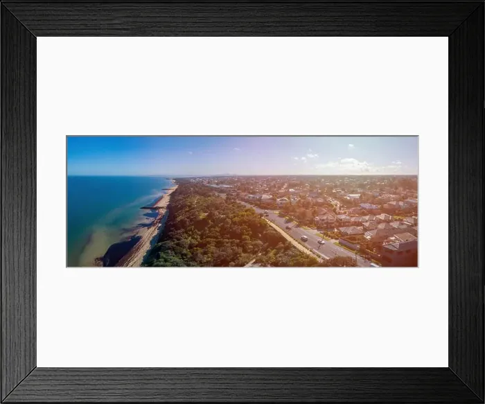 Framed Print : Wide aerial landscape of Black Rock suburb with Melbourne CBD skyscrapers on the horizon Framed Print : Wide aerial landscape of Black Rock suburb with Melbourne CBD skyscrapers on the horizon