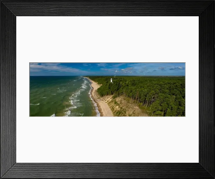 Framed Print : White Uzhava lighthouse on the shore of Baltic Sea. Sunny day Framed Print : White Uzhava lighthouse on the shore of Baltic Sea. Sunny day