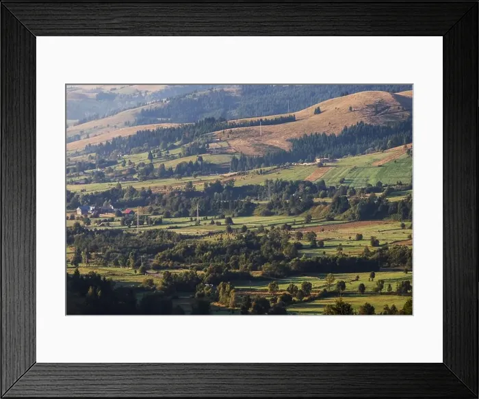 Framed Print : Summer landscape of the mountain village in Bucovina Framed Print : Summer landscape of the mountain village in Bucovina