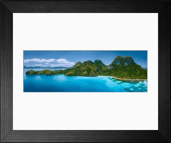 Framed Print : Aerial drone panoramic view of uninhabited tropical island with rugged mountains Framed Print : Aerial drone panoramic view of uninhabited tropical island with rugged mountains