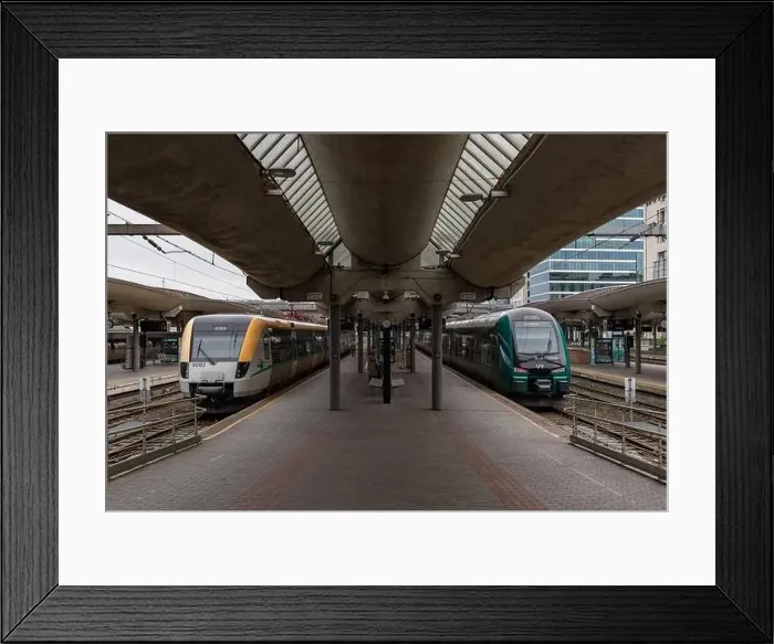 Framed Print : A picture of two trains at the Oslo Central Station, belonging to the companies Vy and Varmlandstrafik Framed Print : A picture of two trains at the Oslo Central Station, belonging to the companies Vy and Varmlandstrafik