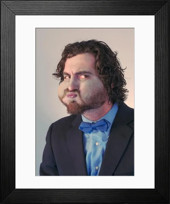 Framed Print : Bearded man holds his breath in anticipation and is turning blue Framed Print : Bearded man holds his breath in anticipation and is turning blue