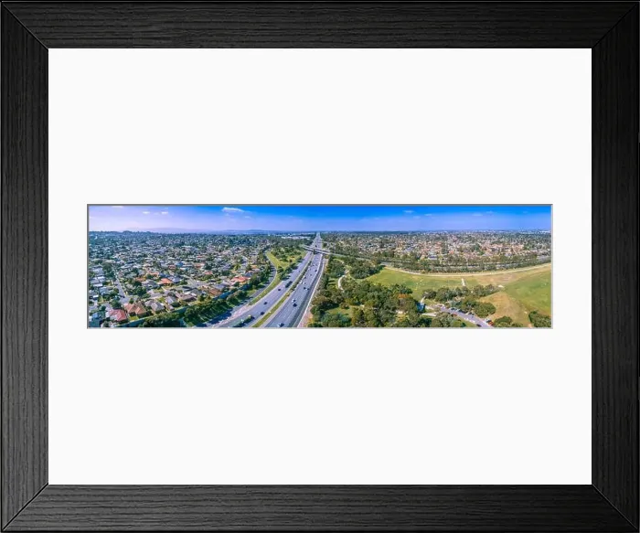 Framed Print : Wide aerial panorama of Monash Freeway passing through Wheelers hill suburb in Melbourne, Australia Framed Print : Wide aerial panorama of Monash Freeway passing through Wheelers hill suburb in Melbourne, Australia