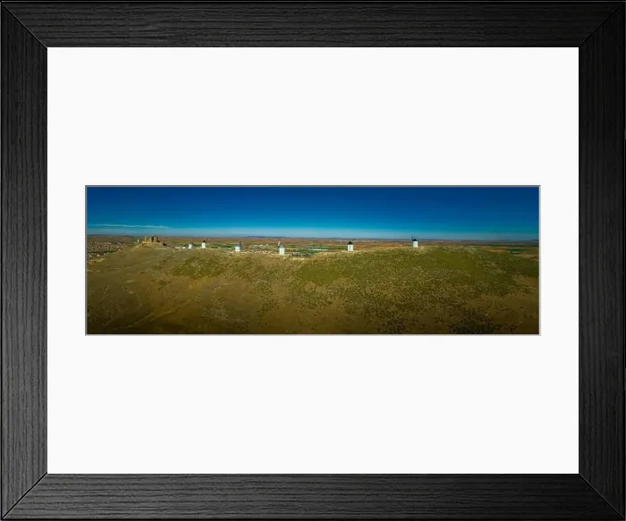 Framed Print : Consuegra castle and windmills aerial view with blue sky in La Mancha Spain famous Don Quixote site aerial panorama Framed Print : Consuegra castle and windmills aerial view with blue sky in La Mancha Spain famous Don Quixote site aerial panorama