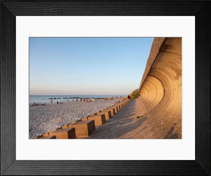 Framed Print : Wide view of a yellow beach full of relaxed people swimming on a clear sea Framed Print : Wide view of a yellow beach full of relaxed people swimming on a clear sea