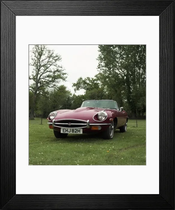 Framed Print : A maroon coloured E-Type Jaguar, 1969 model. Registration EHJ 82H. c1970 Photo by Tony Henshaw Archive Framed Print : A maroon coloured E-Type Jaguar, 1969 model. Registration EHJ 82H. c1970 Photo by Tony Henshaw Archive