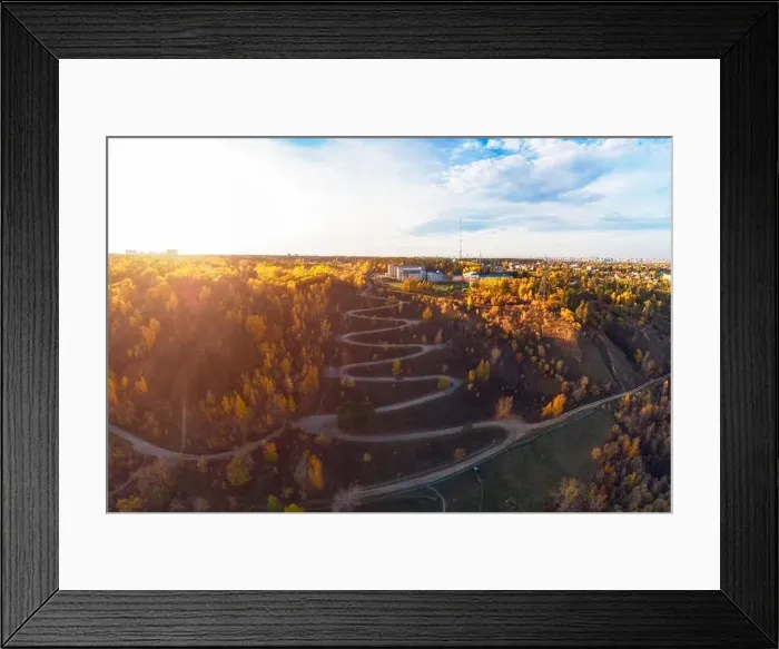 Framed Print : Aerial top vew of winding road in the city Framed Print : Aerial top vew of winding road in the city