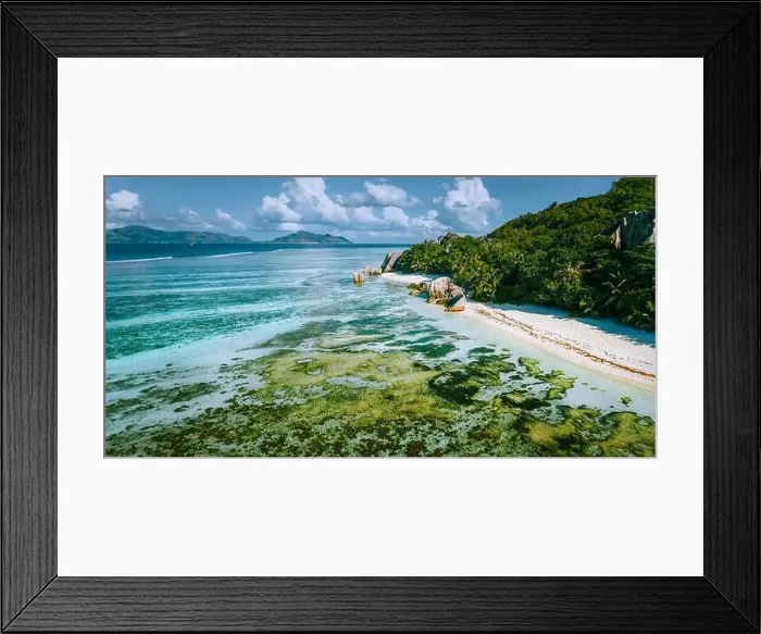Framed Print : Aerial panoramic view of Anse Source d'Argent beach at La Digue island, Seychelles in the morning light Framed Print : Aerial panoramic view of Anse Source d'Argent beach at La Digue island, Seychelles in the morning light