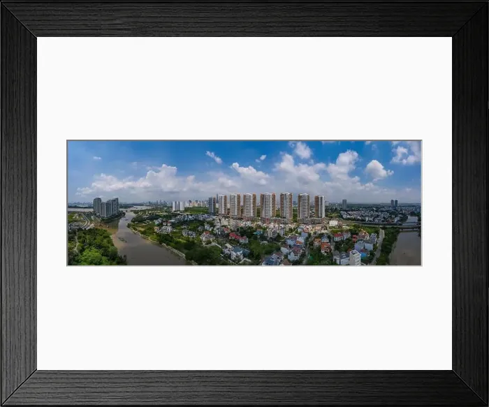 Framed Print : new luxury housing development of eight high rise towers located on a river in southest asia Framed Print : new luxury housing development of eight high rise towers located on a river in southest asia