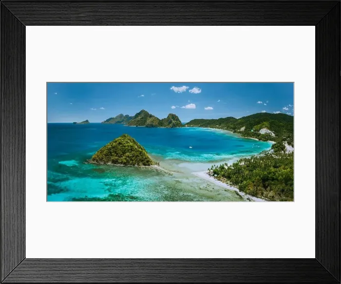 Framed Print : Palawan, Philippines. Las Cabanas beach with rocky mountains and village El Nido in background Framed Print : Palawan, Philippines. Las Cabanas beach with rocky mountains and village El Nido in background