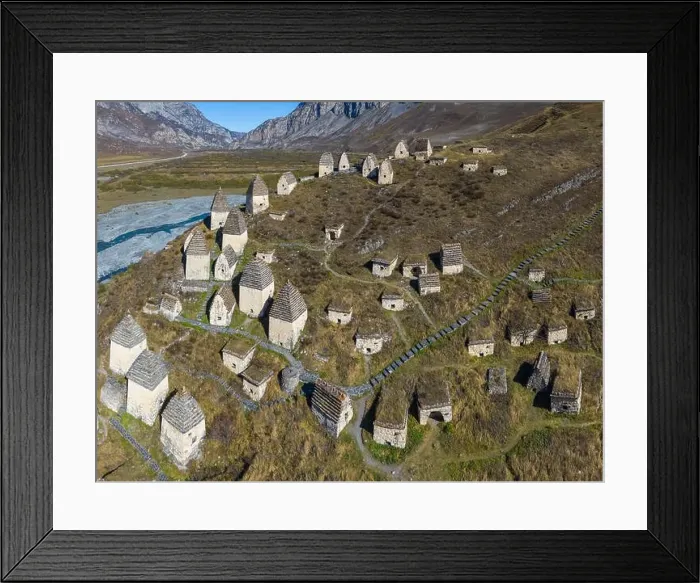 Framed Print : Dargavs, the medieval city of the dead in the mountains of the Caucasus. North Ossetia. Shot on a drone Framed Print : Dargavs, the medieval city of the dead in the mountains of the Caucasus. North Ossetia. Shot on a drone