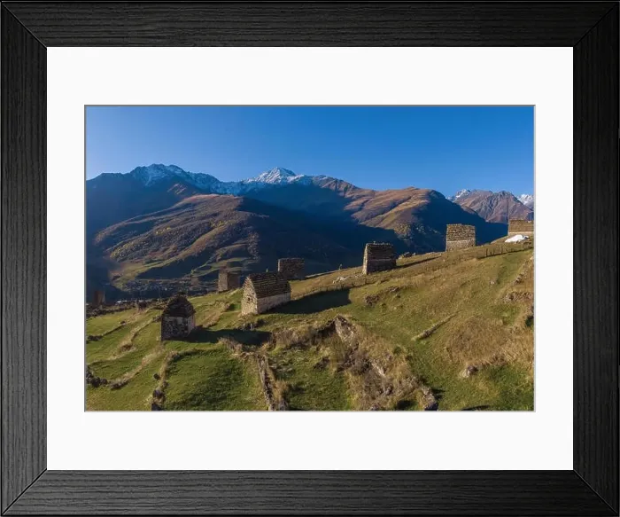 Framed Print : Mountain landscape and medieval architecture of North Ossetia. Shot on a drone Framed Print : Mountain landscape and medieval architecture of North Ossetia. Shot on a drone