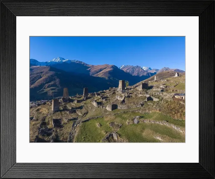 Framed Print : Mountain landscape and medieval architecture of North Ossetia. Shot on a drone Framed Print : Mountain landscape and medieval architecture of North Ossetia. Shot on a drone