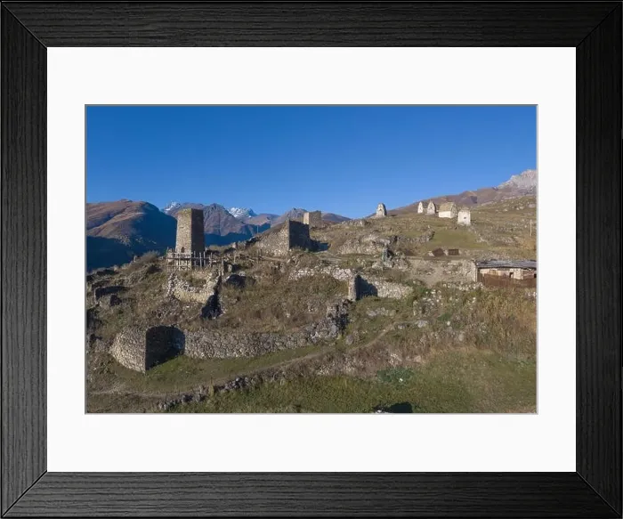 Framed Print : Mountain landscape and medieval architecture of North Ossetia. Shot on a drone Framed Print : Mountain landscape and medieval architecture of North Ossetia. Shot on a drone