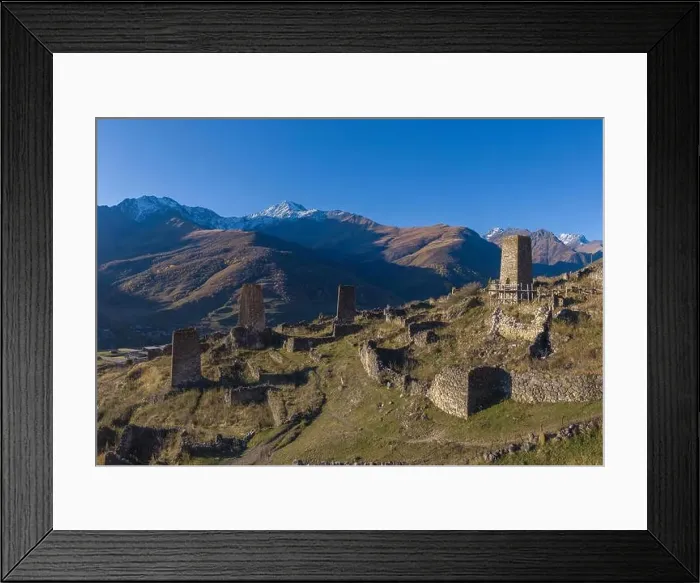 Framed Print : Mountain landscape and medieval architecture of North Ossetia. Shot on a drone Framed Print : Mountain landscape and medieval architecture of North Ossetia. Shot on a drone