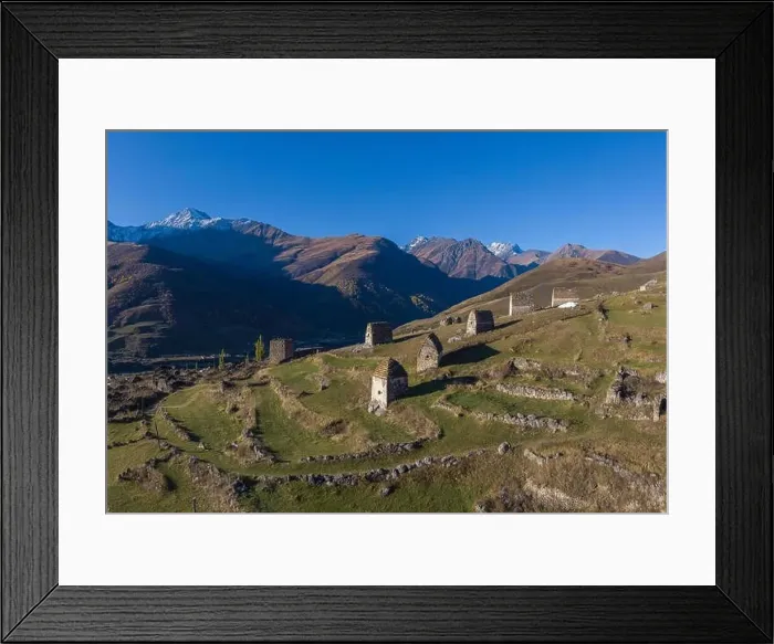 Framed Print : Mountain landscape and medieval architecture of North Ossetia. Shot on a drone Framed Print : Mountain landscape and medieval architecture of North Ossetia. Shot on a drone