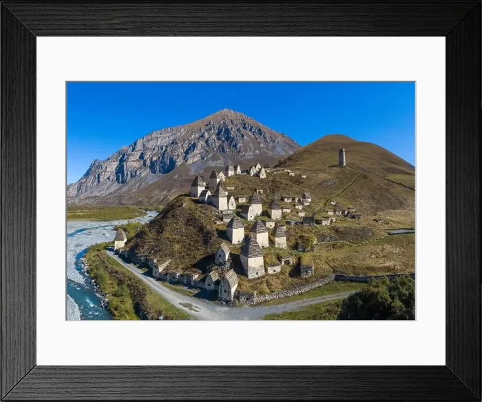 Framed Print : Dargavs, the medieval city of the dead in the mountains of the Caucasus. North Ossetia. Shot on a drone Framed Print : Dargavs, the medieval city of the dead in the mountains of the Caucasus. North Ossetia. Shot on a drone