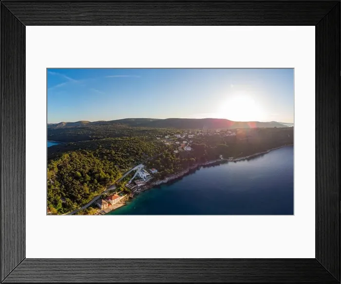 Framed Print : Spectacular aerial landscape with fishing village near peninsula stretching into the sea Framed Print : Spectacular aerial landscape with fishing village near peninsula stretching into the sea