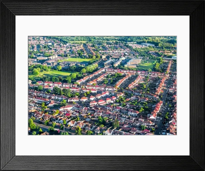 Framed Print : Aerial high angle bird's eye view from airplane over city of London in United Kingdom with terraced houses buildings