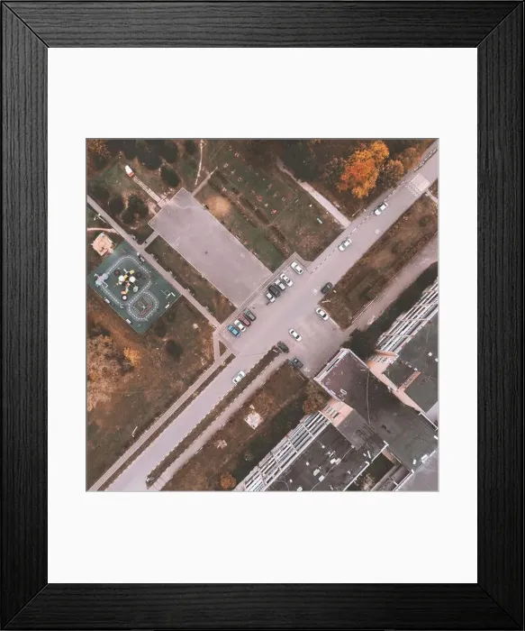 Framed Print : Courtyard of small town with children playground, parking with cars, green lawn and roads. Drone view Framed Print : Courtyard of small town with children playground, parking with cars, green lawn and roads. Drone view