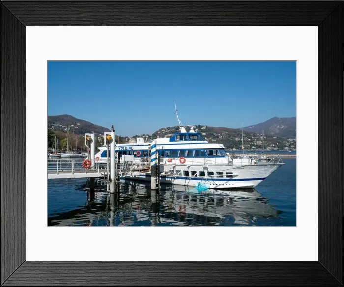 Framed Print : Amazing view of fast ship in Como - Como lake in Italy Framed Print : Amazing view of fast ship in Como - Como lake in Italy