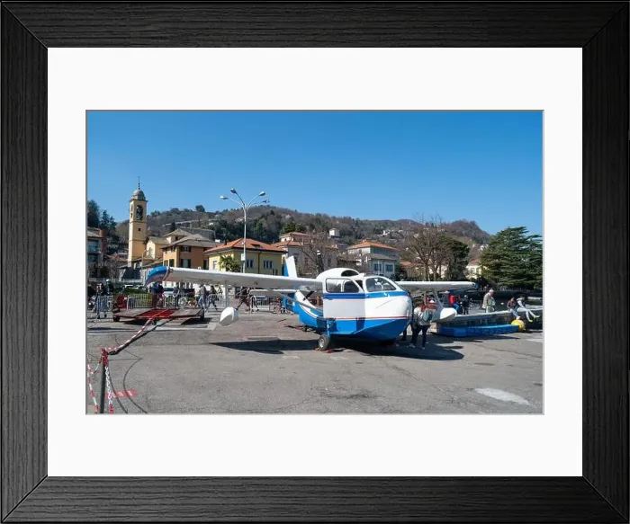 Framed Print : Beautiful airplane in Como - Como lake in Italy Framed Print : Beautiful airplane in Como - Como lake in Italy