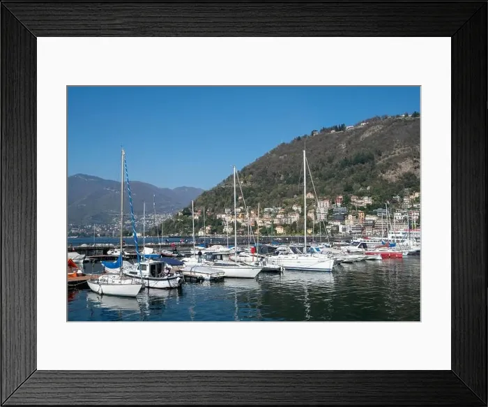 Framed Print : Beautiful view with port in Como - Como lake in Italy Framed Print : Beautiful view with port in Como - Como lake in Italy