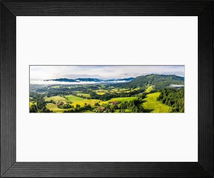 Framed Print : Aerial Bad Toelz Bavarian Alps. Golf Course. Blomberg Mountain. Morning Drone Shot with some clouds in the sky