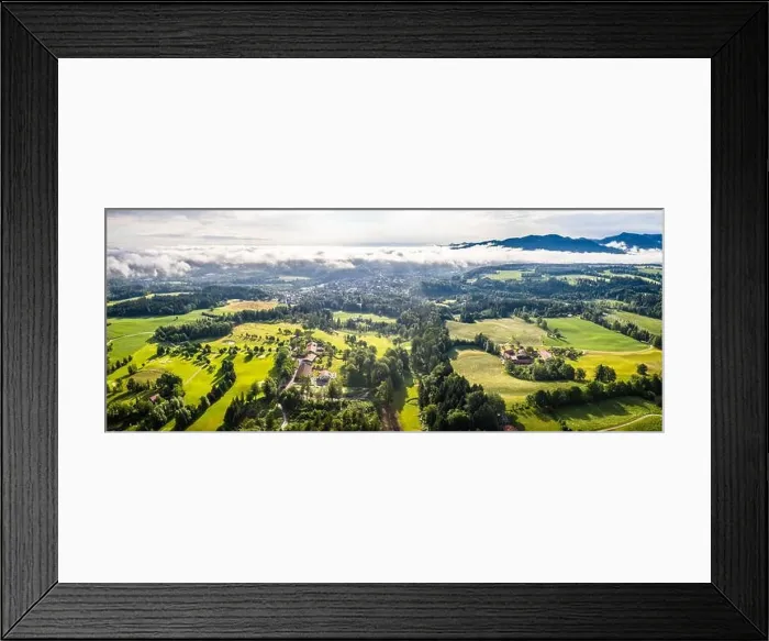 Framed Print : Aerial Bad Toelz Bavarian Alps. Golf Course. Blomberg Mountain. Morning Drone Shot with some clouds in the sky