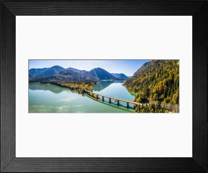 Framed Print : Scenic aerial view of the bridge over Lake Sylvenstein with beautiful reflections Framed Print : Scenic aerial view of the bridge over Lake Sylvenstein with beautiful reflections