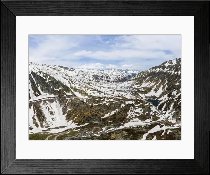 Framed Print : Stunning aerial view of the Gotthard pass and road in the swiss alps between the Canton of Ticino and Uri in Switzerland Framed Print : Stunning aerial view of the Gotthard pass and road in the swiss alps between the Canton of Ticino and Uri in Switzerland