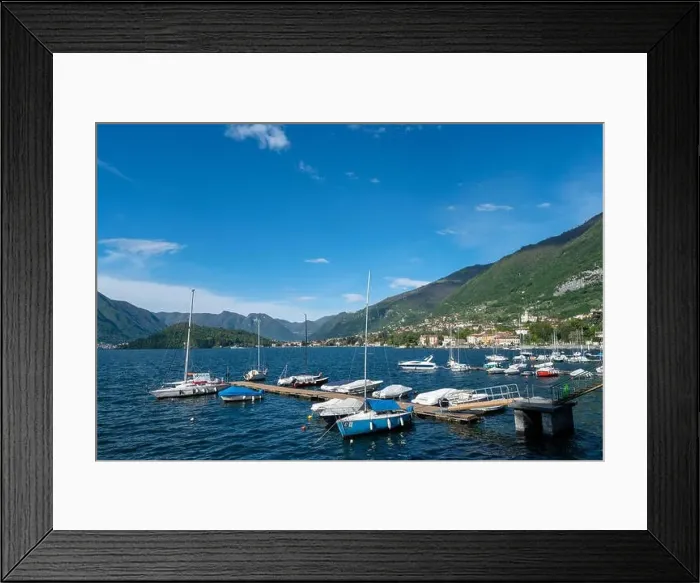 Framed Print : Amazing view of port with boats in Tremezzo - Como lake in Italy Framed Print : Amazing view of port with boats in Tremezzo - Como lake in Italy